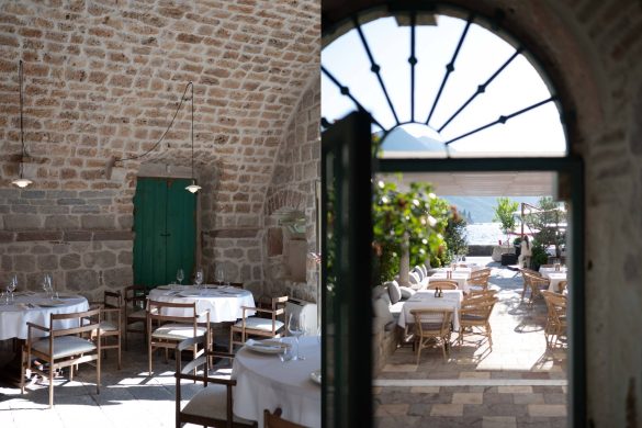 Enterijer restorana Eho u Perastu sa kamenim svodovima i pogledom ka bašti i moru