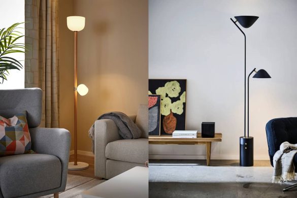 Dve podne lampe u enterijeru, jedna sa drvenim postoljem i staklenim abažurom, druga crna sa dva svetlosna izvora